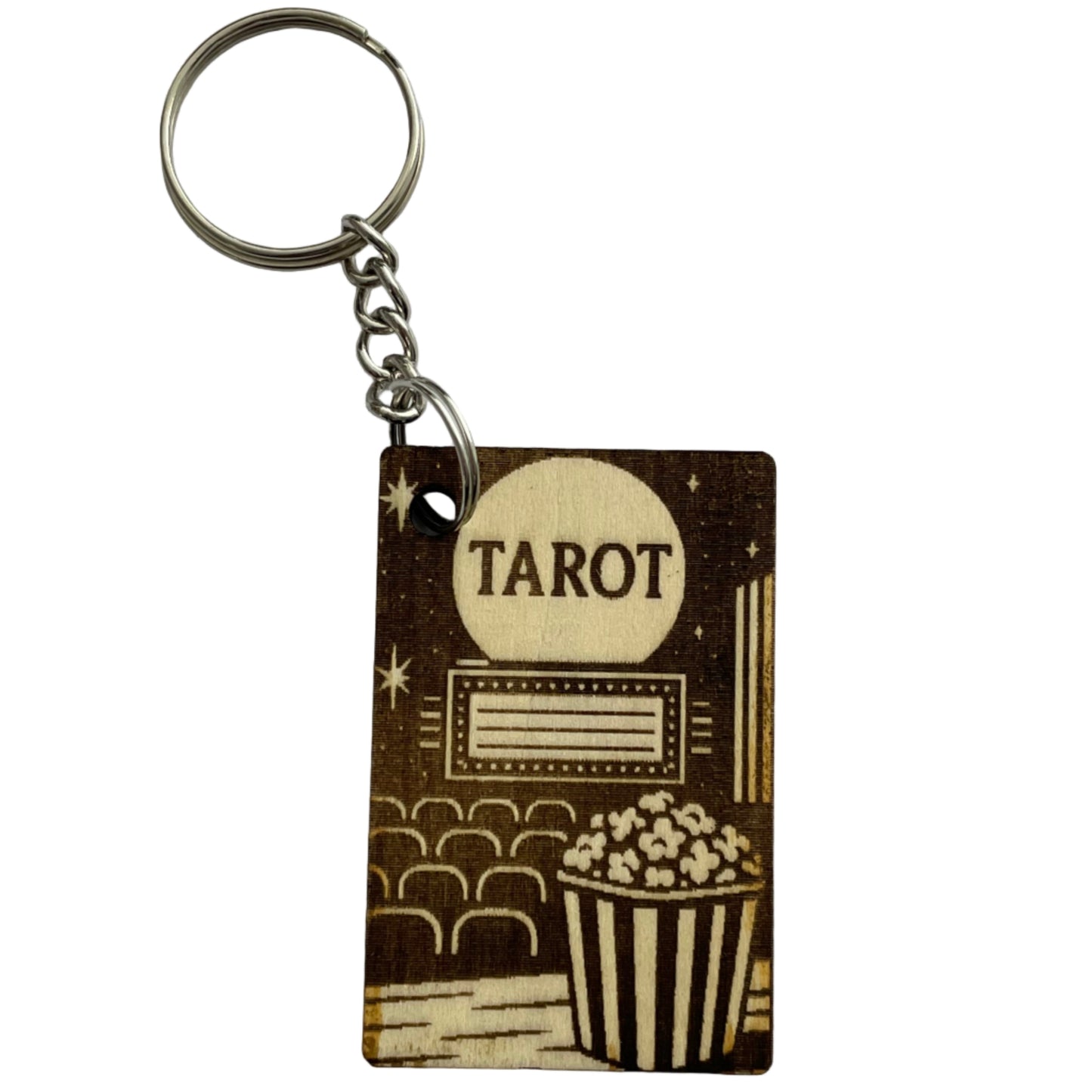 Keychain with tarot card design on a gray background