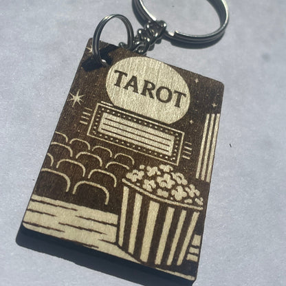 Keychain with tarot card design on a gray background
