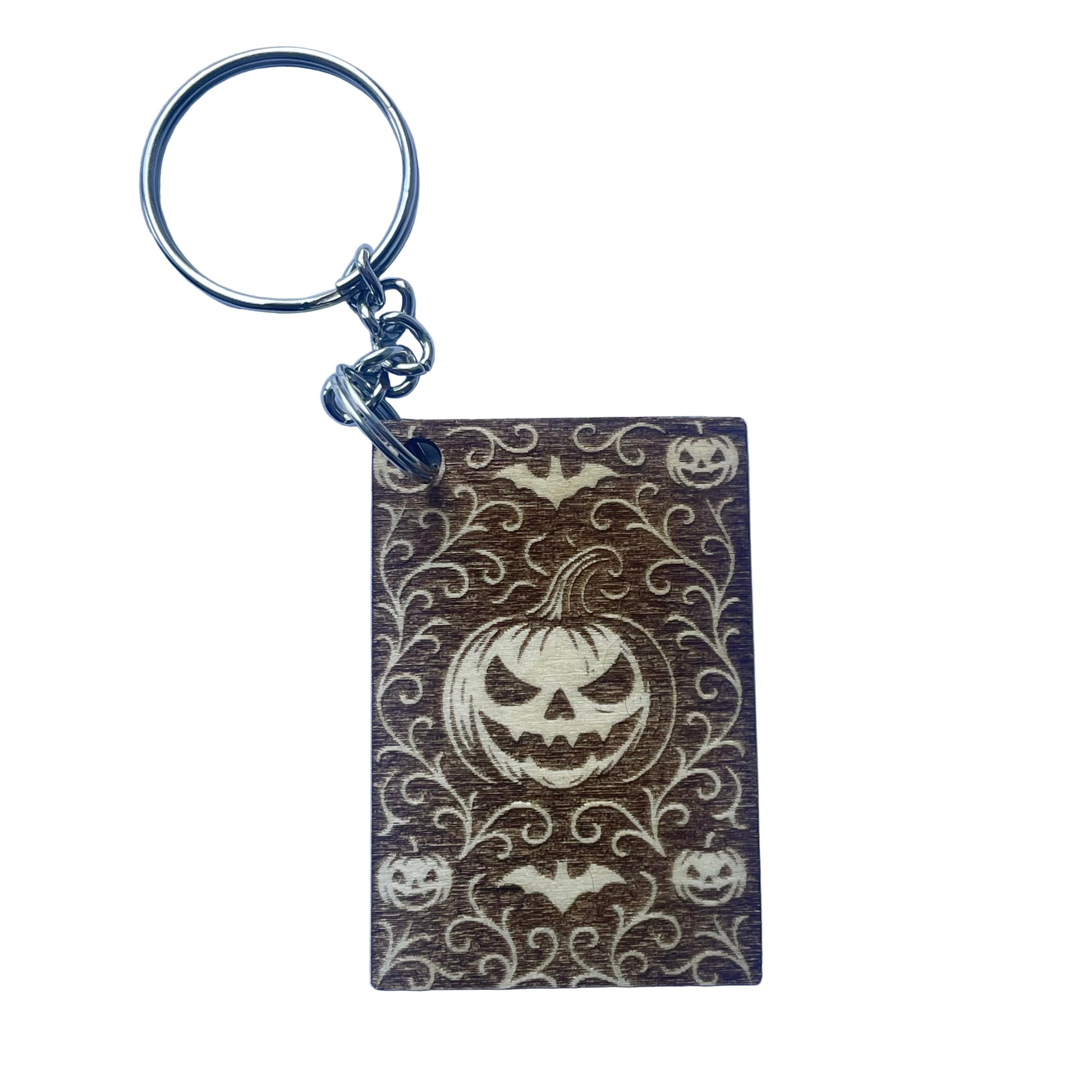 Keychain with Halloween design featuring pumpkins and bats on a purple background