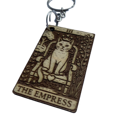 Keychain with 'The Empress' tarot card design featuring a cat on a throne.